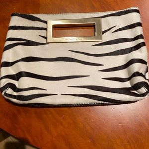 Michael Kors clutch. Faux zebra fur. Cream & black. Very cute & fun!